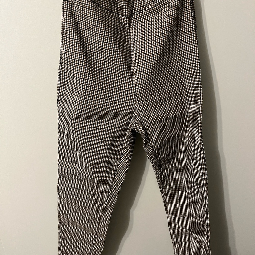 Pantalones de cuadros con bolsillos y cintura ancha